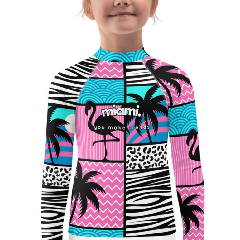 kids long sleeve rash guard swim top UPF50 miami by night blue pink art deco.