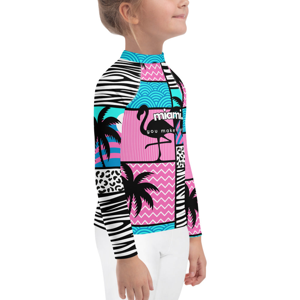 kids long sleeve rash guard swim top UPF50 miami by night blue pink art deco.